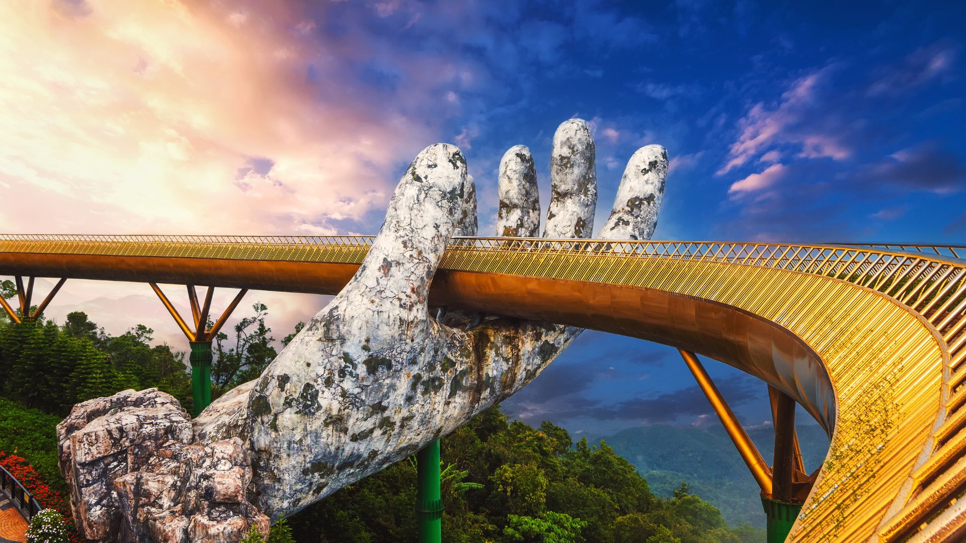 The Golden Bridge held up by giant stone hands, Ba Na Hills, Vietnam